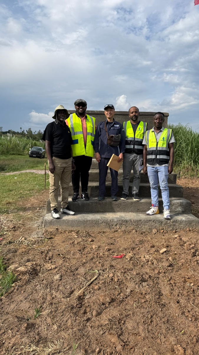 Project team at the completed wellhead